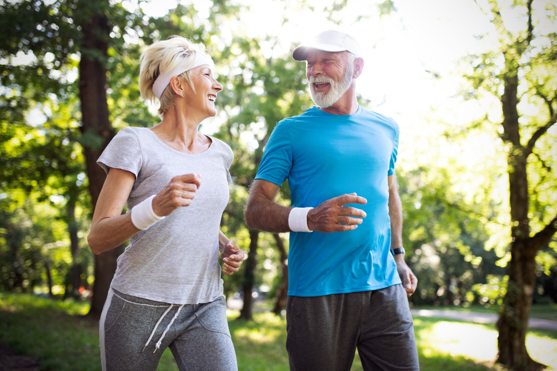 Happy mature people couple exercising for healthy life